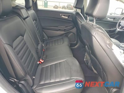 Zdjęcie 11 z 13 samochodu: 2021 FORD EDGE SEL VIN:2FMPK3J99MBA10081 - miniatura