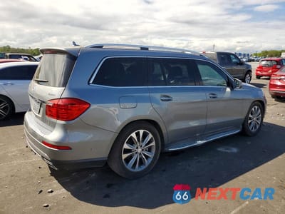Trzecie zdjęcie samochodu z tyłu: 2015 MERCEDES-BENZ GL 450 4MATIC VIN:4JGDF6EE9FA542770 - miniatura