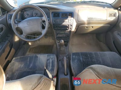 Zdjęcie 8 z 12 samochodu: 1997 TOYOTA COROLLA VIN:1NXBA02E9VZ659043 - miniatura