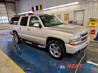 Czwarte zdjęcie samochodu z boku: 2006 CHEVROLET SUBURBAN K1500 VIN:3GNFK16U56G114849 - miniatura