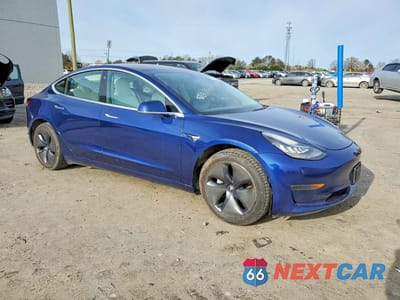 Czwarte zdjęcie samochodu z boku: 2018 TESLA MODEL 3 VIN:5YJ3E1EB5JF096502 - miniatura