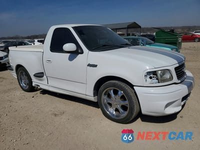 Czwarte zdjęcie samochodu z boku: 2002 FORD F150 SVT LIGHTNING VIN:2FTZF07332CA86454 - miniatura