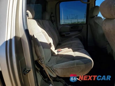 Zdjęcie 10 z 12 samochodu: 2001 FORD F-150 VIN:1FTRW07L81KA90283 - miniatura
