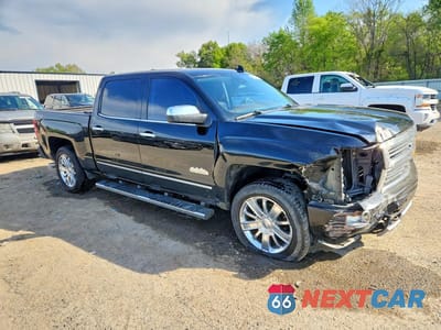 Czwarte zdjęcie samochodu z boku: 2015 CHEVROLET SILVERADO K1500 HIGH COUNTRY VIN:3GCUKTEC1FG303566 - miniatura