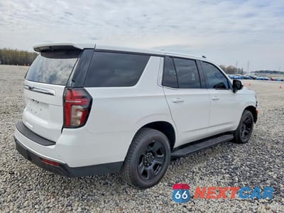 Trzecie zdjęcie samochodu z tyłu: 2022 CHEVROLET TAHOE C1500 VIN:1GNSCLED9NR247816 - miniatura
