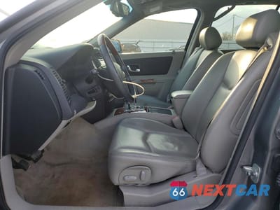 Zdjęcie 7 z 14 samochodu: 2004 CADILLAC SRX VIN:1GYDE637540119144 - miniatura
