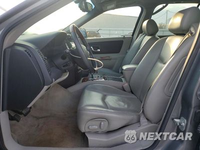 Zdjęcie 7 z 14 samochodu: 2004 CADILLAC SRX VIN:1GYDE637540119144 - miniatura