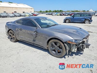 Czwarte zdjęcie samochodu z boku: 2022 FORD MUSTANG VIN:1FA6P8THXN5111550 - miniatura