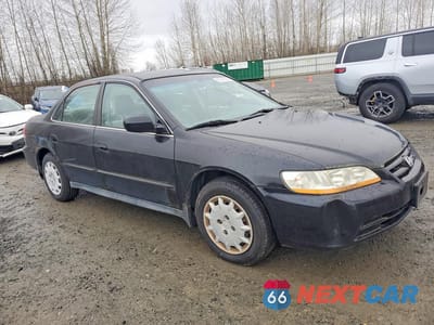 Czwarte zdjęcie samochodu z boku: 2002 HONDA ACCORD LX VIN:3HGCG564X2G703072 - miniatura