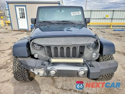 Piąte zdjęcie samochodu w środku: 2014 JEEP WRANGLER UNLIMITED SPORT VIN:1C4BJWDG0EL160806 - miniatura