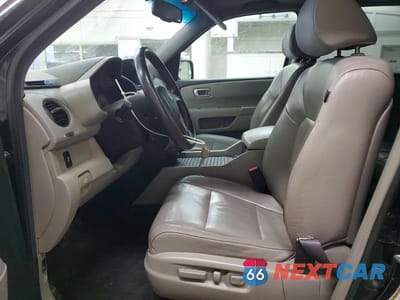 Zdjęcie 7 z 13 samochodu: 2012 HONDA PILOT EXL VIN:5FNYF4H5XCB501752 - miniatura
