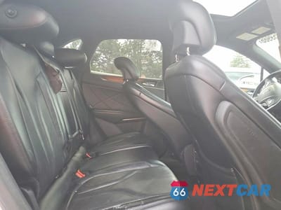 Zdjęcie 11 z 12 samochodu: 2017 LINCOLN MKC RESERVE VIN:5LMCJ3D98HUL32561 - miniatura