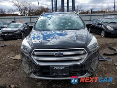 Piąte zdjęcie samochodu w środku: 2017 FORD ESCAPE TITANIUM VIN:1FMCU9JD0HUC84866 - miniatura