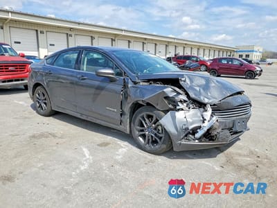 Czwarte zdjęcie samochodu z boku: 2018 FORD FUSION SE HYBRID VIN:3FA6P0LU3JR248206 - miniatura