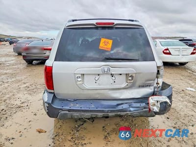 Zdjęcie 6 z 12 samochodu: 2005 HONDA PILOT EX VIN:2HKYF18475H526151 - miniatura