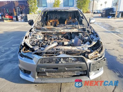 Piąte zdjęcie samochodu w środku: 2015 MITSUBISHI LANCER EVOLUTION GSR VIN:JA32W8FV4FU026450 - miniatura