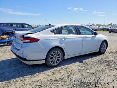 Trzecie zdjęcie samochodu z tyłu: 2017 FORD FUSION SE HYBRID VIN:3FA6P0LU7HR409523 - miniatura