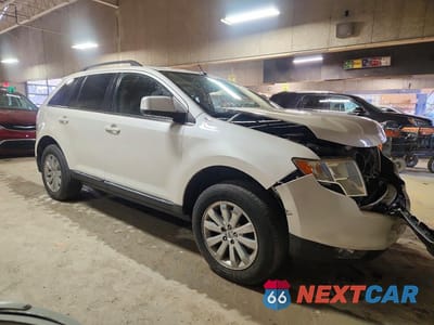 Czwarte zdjęcie samochodu z boku: 2010 FORD EDGE LIMITED VIN:2FMDK4KC2ABB17679 - miniatura