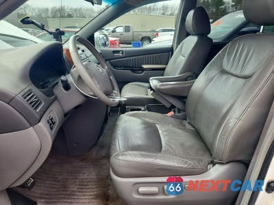 Zdjęcie 7 z 11 samochodu: 2010 TOYOTA SIENNA XLE VIN:5TDYK4CC4AS295080 - miniatura