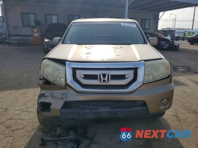 Piąte zdjęcie samochodu w środku: 2009 HONDA PILOT EXL VIN:5FNYF38519B000915 - miniatura
