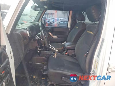 Zdjęcie 7 z 13 samochodu: 2016 JEEP WRANGLER UNLIMITED SAHARA VIN:1C4HJWEG3GL106377 - miniatura
