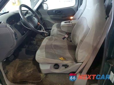 Zdjęcie 7 z 12 samochodu: 1999 FORD F150 VIN:1FTRX18L1XNA06068 - miniatura