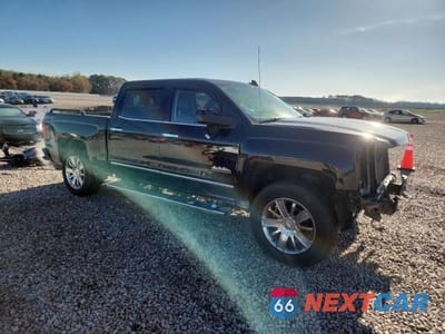 Czwarte zdjęcie samochodu z boku: 2015 CHEVROLET SILVERADO K1500 HIGH COUNTRY VIN:3GCUKTEC9FG445972 - miniatura