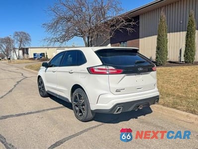 Trzecie zdjęcie samochodu z tyłu: 2020 FORD EDGE ST VIN:2FMPK4AP6LBA74825 - miniatura