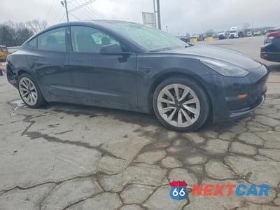 Czwarte zdjęcie samochodu z boku: 2023 TESLA MODEL 3 VIN:5YJ3E1EB6PF391990 - miniatura