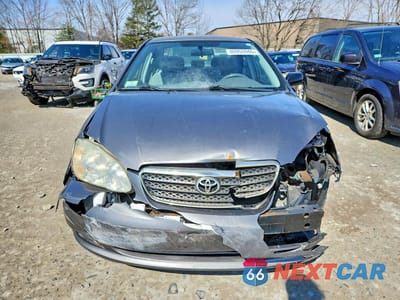 Piąte zdjęcie samochodu w środku: 2005 TOYOTA COROLLA CE VIN:1NXBR32E35Z381671 - miniatura