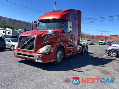 Zdjęcie 12 z 14 samochodu: 2014 VOLVO VNL TRUCKS SEMI TRUCK VIN:4V4NC9TJ6EN177222 - miniatura