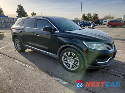 Czwarte zdjęcie samochodu z boku: 2016 LINCOLN MKX RESERVE VIN:2LMTJ8LR4GBL43938 - miniatura
