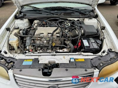 Zdjęcie 7 z 10 samochodu: 1999 CHEV MALIBU VIN:1G1ND52MXXY158289 - miniatura