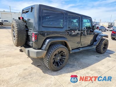 Trzecie zdjęcie samochodu z tyłu: 2016 JEEP WRANGLER UNLIMITED SAHARA VIN:1C4BJWEG8GL163812 - miniatura