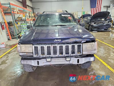 Piąte zdjęcie samochodu w środku: 1997 JEEP GRAND CHEROKEE LAREDO VIN:1J4GZ58S6VC714724 - miniatura