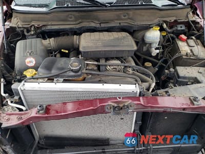 Zdjęcie 11 z 12 samochodu: 2002 DODGE RAM 1500 VIN:3D7HA18N32G140599 - miniatura