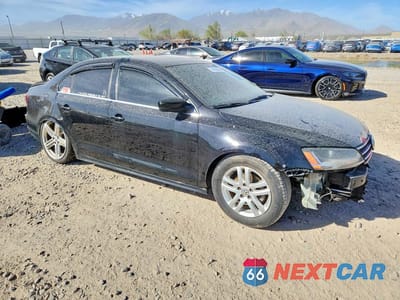 Czwarte zdjęcie samochodu z boku: 2017 VOLKSWAGEN JETTA S VIN:3VW167AJ1HM211264 - miniatura