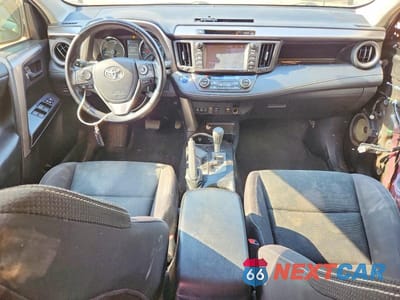 Zdjęcie 8 z 13 samochodu: 2018 TOYOTA RAV4 HYBRID XLE VIN:JTMRJREV9JD180862 - miniatura