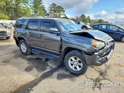 Czwarte zdjęcie samochodu z boku: 2014 TOYOTA 4RUNNER SR5 VIN:JTEZU5JR4E5069866 - miniatura