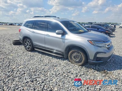 Czwarte zdjęcie samochodu z boku: 2019 HONDA PILOT TOURING VIN:5FNYF5H62KB010802 - miniatura