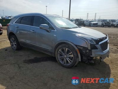 Czwarte zdjęcie samochodu z boku: 2024 CADILLAC XT5 PREMIUM LUXURY VIN:1GYKNDR42RZ701472 - miniatura