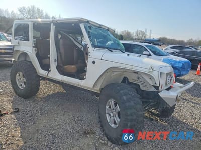 Czwarte zdjęcie samochodu z boku: 2012 JEEP WRANGLER UNLIMITED SAHARA VIN:1C4HJWEG5CL113762 - miniatura
