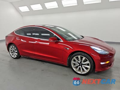 Czwarte zdjęcie samochodu z boku: 2019 TESLA MODEL 3 VIN:5YJ3E1EA4KF413209 - miniatura