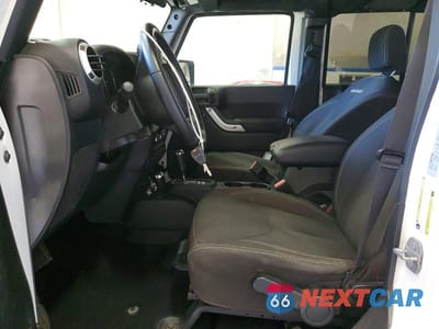Zdjęcie 7 z 14 samochodu: 2017 JEEP WRANGLER UNLIMITED SAHARA VIN:1C4BJWEG5HL733833 - miniatura