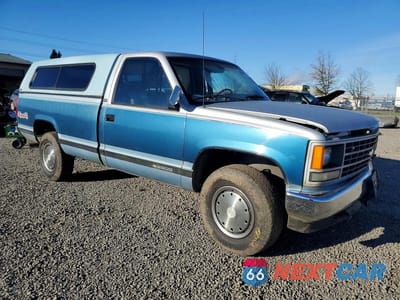 Czwarte zdjęcie samochodu z boku: 1990 CHEVROLET GMT-400 K2500 VIN:2GCFK24KXL1135295 - miniatura