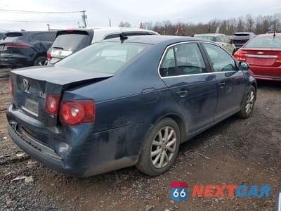 Trzecie zdjęcie samochodu z tyłu: 2010 VOLKSWAGEN JETTA SE VIN:3VWRZ7AJ4AM034712 - miniatura