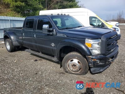Czwarte zdjęcie samochodu z boku: 2014 FORD F450 SUPER DUTY VIN:1FT8W4DT5EEB21615 - miniatura