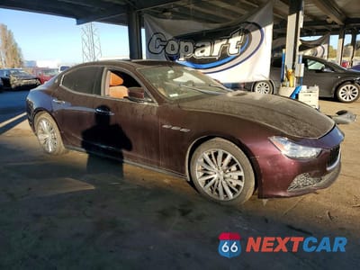 Czwarte zdjęcie samochodu z boku: 2016 MASERATI GHIBLI VIN:ZAM57XSA9G1173810 - miniatura