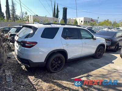 Czwarte zdjęcie samochodu z boku: 2025 HONDA PILOT TOURING VIN:5FNYG1H78SB064992 - miniatura