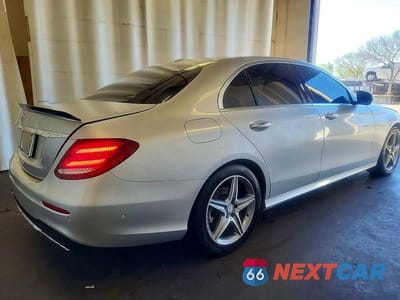 Czwarte zdjęcie samochodu z boku: 2017 MERCEDES-BENZ E 300 VIN:WDDZF4JBXHA033046 - miniatura